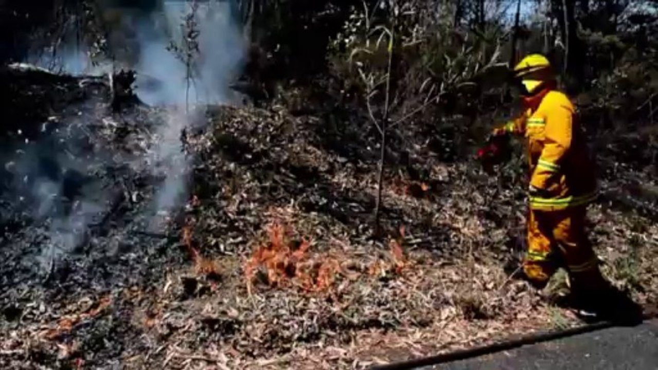 Australia fires flare as military blamed, pilot killed
