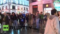 Spain_ Students pour scorn on police baton charge
