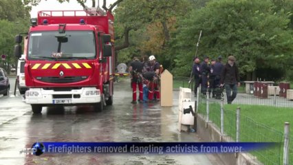 Greenpeace activists stage Eiffel Tower protest