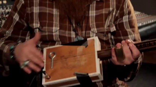Pinecone Fletcher with Hobo King Cigar Box Guitar