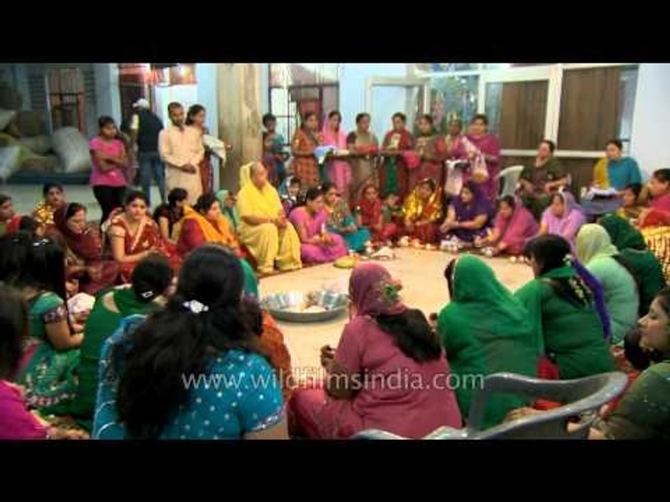 Women performing Karva Chauth rituals