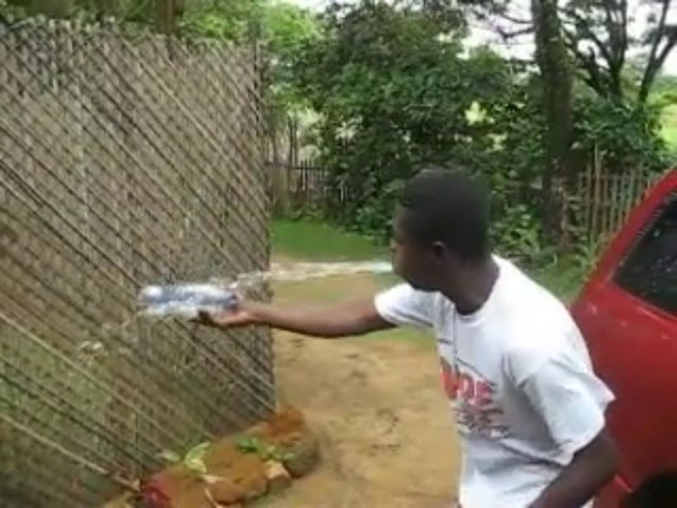 Liberian Water Man - This guy plays with water... and puck!!!