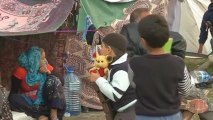 As civilians allowed to flee besieged Syrian town, refugees face hurdles