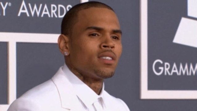 Brown in rehab, Perry tops charts