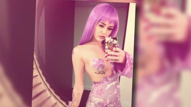 Miley Cyrus Dresses As Lil Kim For Halloween