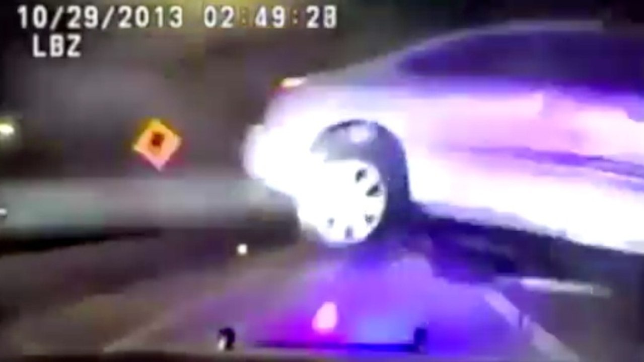 Watch this Drunk Guy Hit a Cop Car Sideways