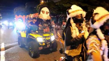 Halloween revellers parade in Colombian city of Cali