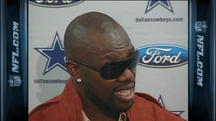 Owens in response to Romo critics: 'That's my quarterback'