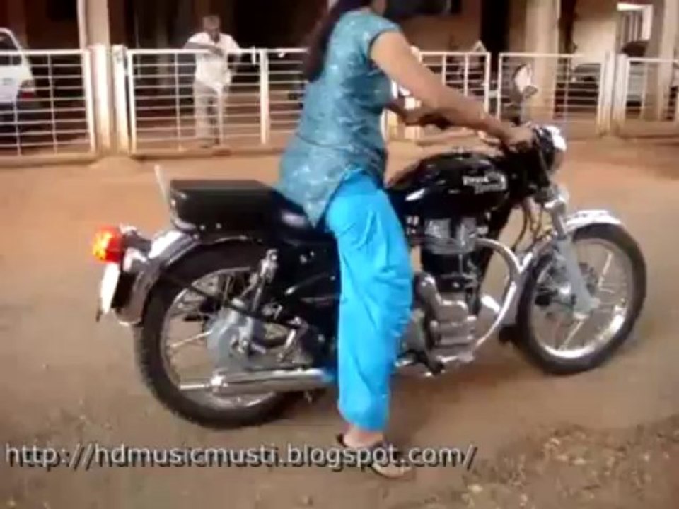 girl drivening a moter bick