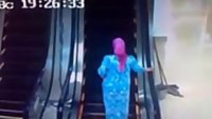 People using the escalator for the first time