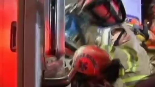 NY student rescued after being trapped between two walls