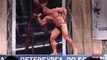 Russian bodybuilder dance like a Bollywood film star and then a chicken during a competition - YouTube [360p]