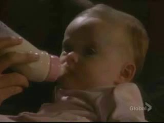 Shawn feeds and talks to Claire March 15, 2006