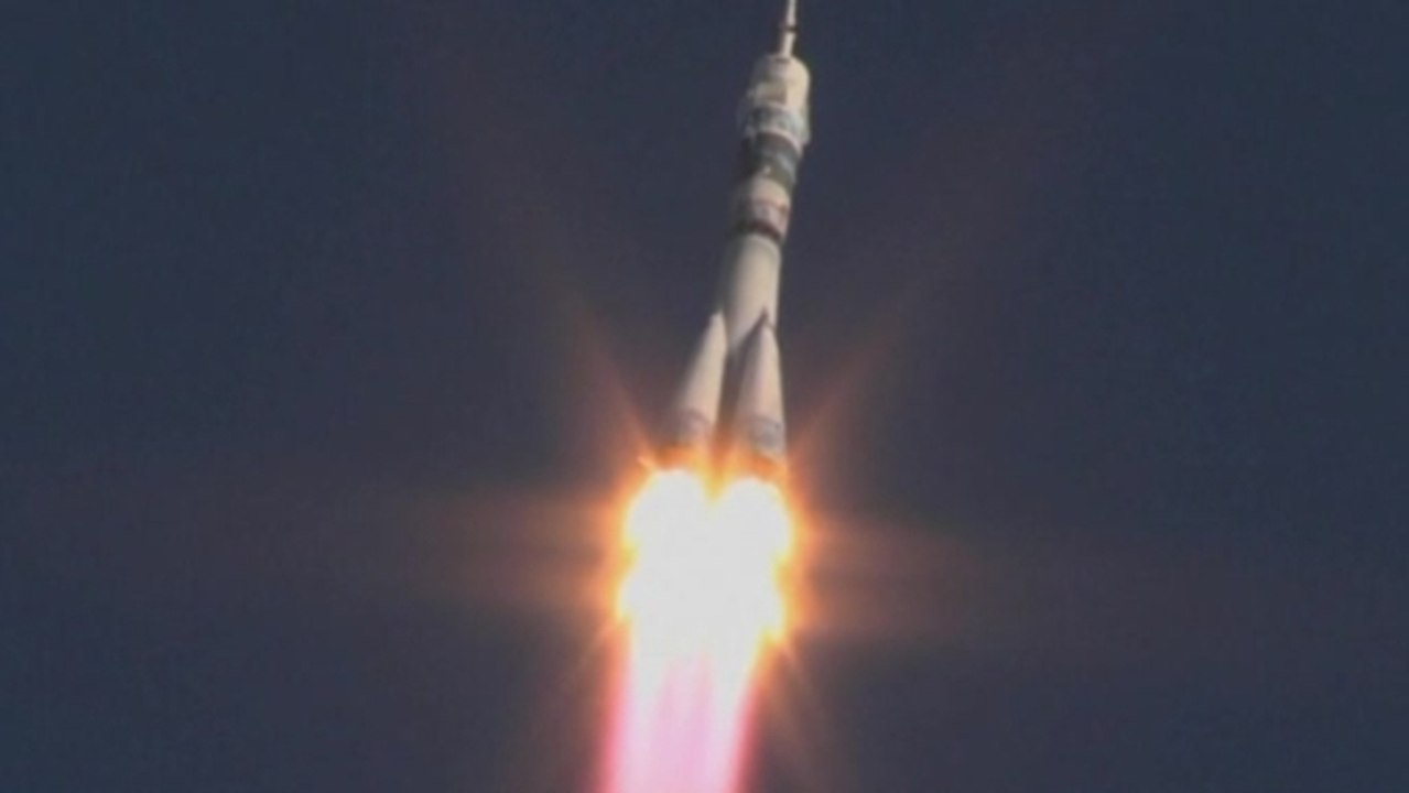 Olympic torch blasts off