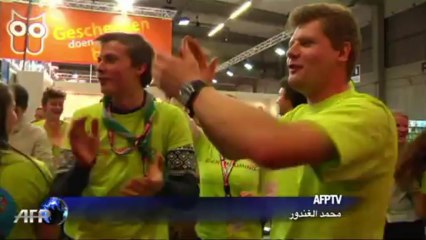 رقم قياسي في دحرجة الكتب على طريقة احجار الدومينو في بلجيكا