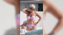 Denise Welch Glows Poolside in a Stripy Bikini