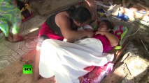 NEWS FLASH 'Miracle' baby video_ Girl born in Philippines typhoon rubble