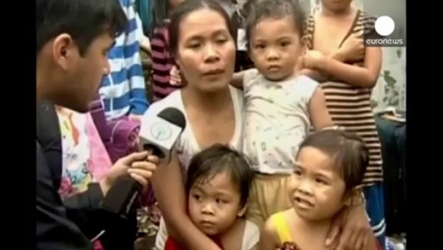 Tacloban in ruins as the number of dead after Typhoon Haiyan is revised