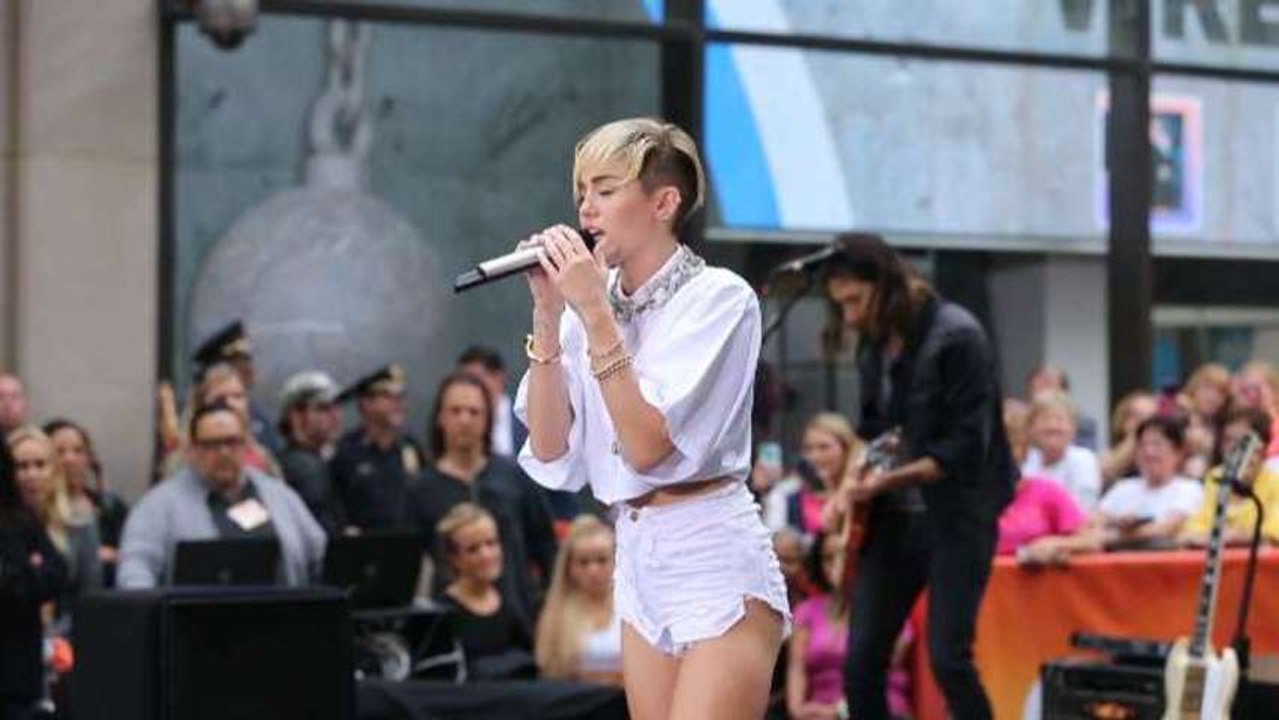 Miley Cyrus Lights Up Onstage at EMAs