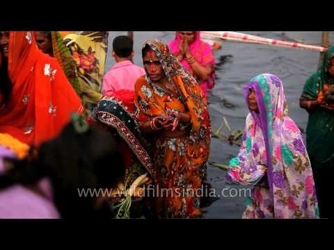 Women offering prayers to God Sun - Chhath Puja