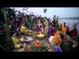 Hindu women devotee performing rituals during the Chhath Puja festival