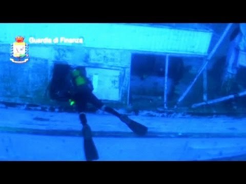 Divers pull 38 more bodies from hold of sunken migrant boat near Lampedusa