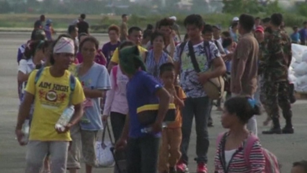 Thousands of Filipinos displaced by the typhoon arrive in Cebu island