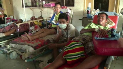 No roof, water or power, but typhoon hospital battles on