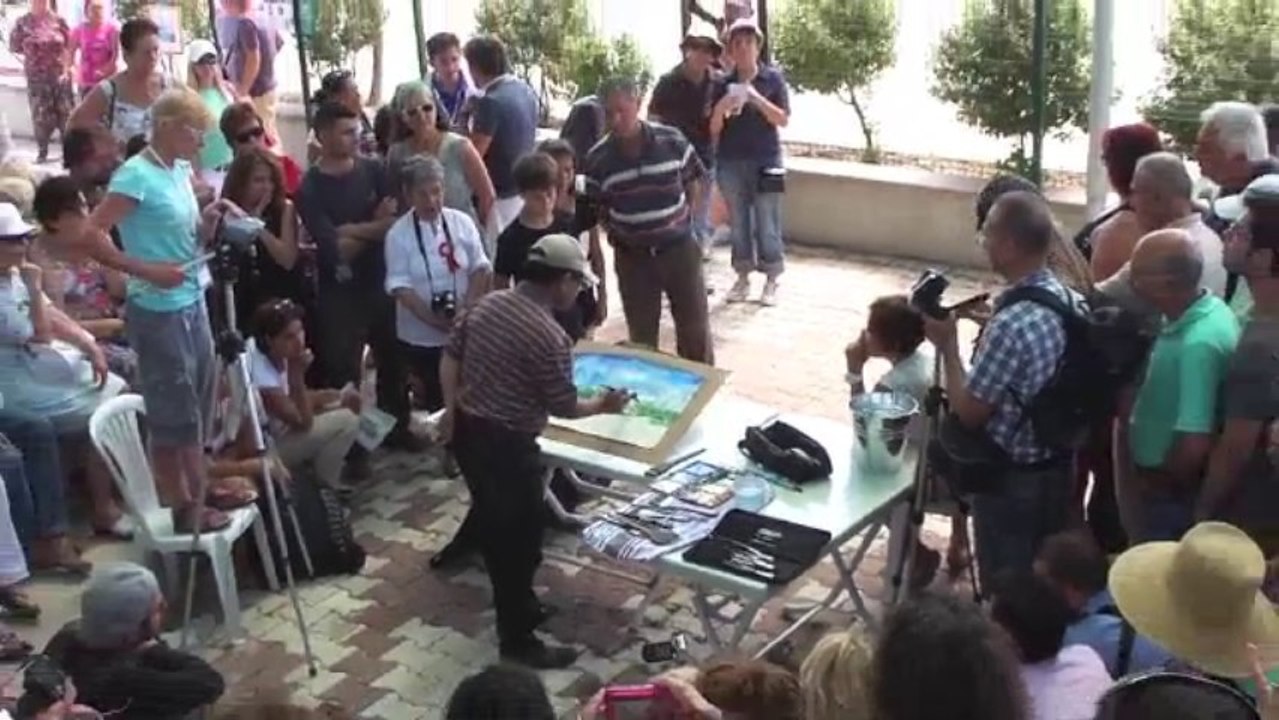 Sarfraz Musawir live painting at IWS, Izmir Turkey