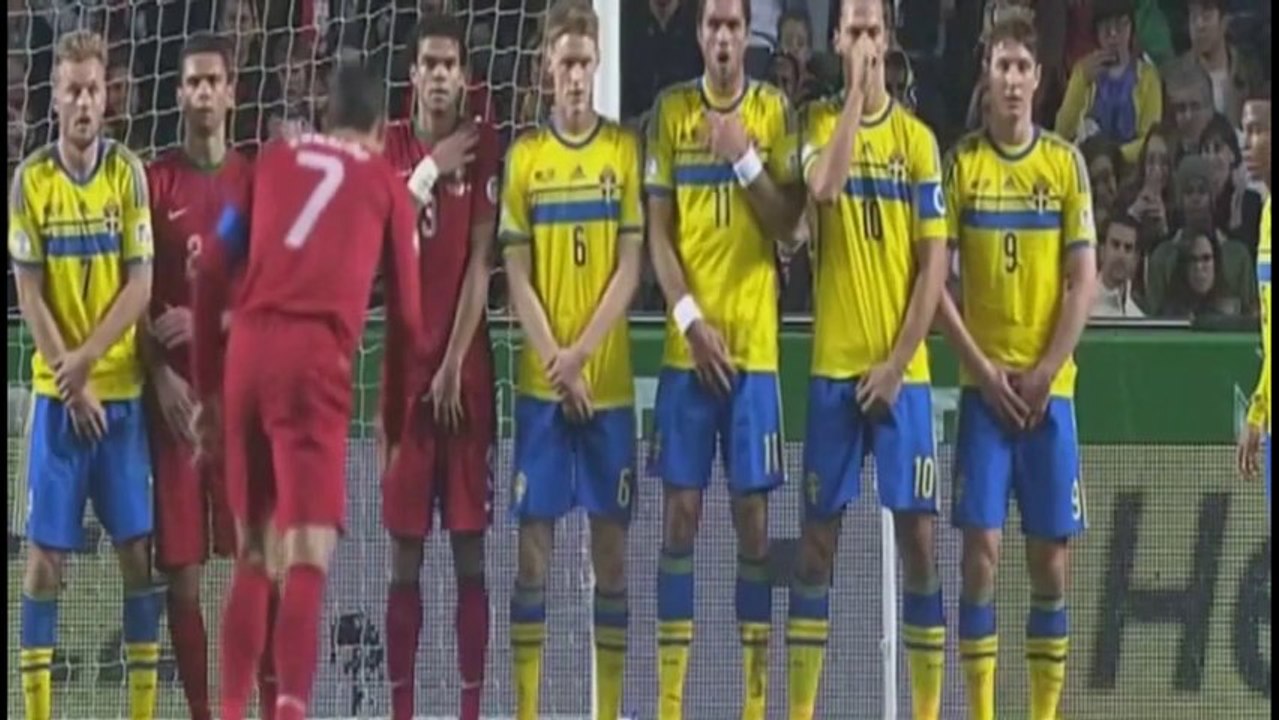 Zlatan Ibrahimovic protects his nose in the wall for a Cristiano Ronaldo free kick