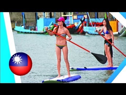 Sexy bikini girls test waves as surfing championship kicks off