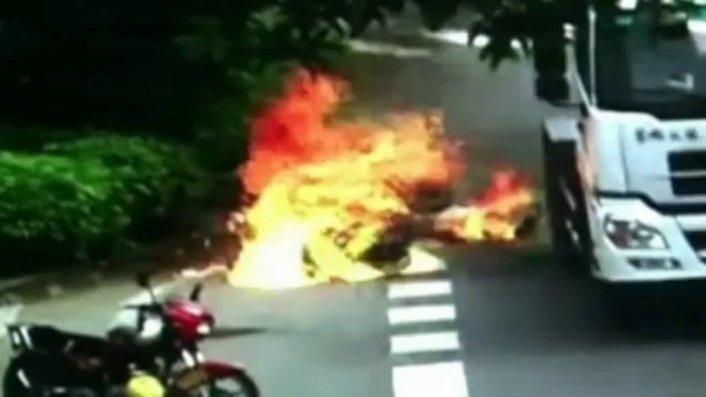 Dramatic CCTV: Chinese motorcyclist set on fire after lorry