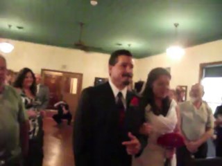 Kerri is walked to the altar by dad