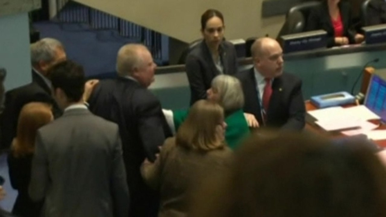 Embattled Toronto knocks down councillor during meeting to limit his powers