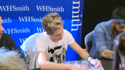 One Direction meet and greet fans at top secret book signing