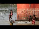 Kids playing in the waters of Hooghly: In Kolkata