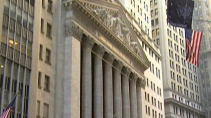 US investors celebrate as Dow hits new peak