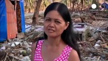 Philippines typhoon nightmare survivors barely scraping by