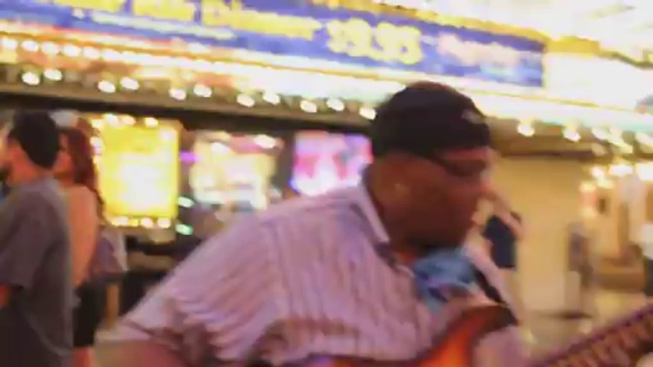 A mouthfull of G-String. Biting the bass on Fremont Street, Las Vegas.