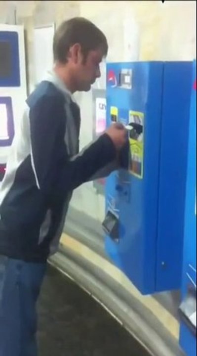 Drunk guy trying to pay parking bill. Funny...