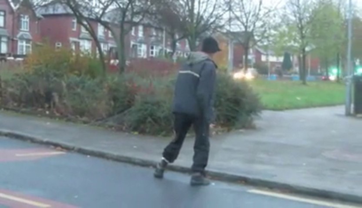 Drunk guy crossing the street.