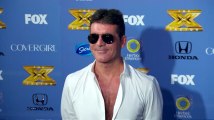 Simon Cowell Says Son Will Compete With Kelly Clarkson's Kid