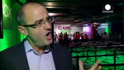 Microsoft launches new Xbox One console as hi-tech competition hots up