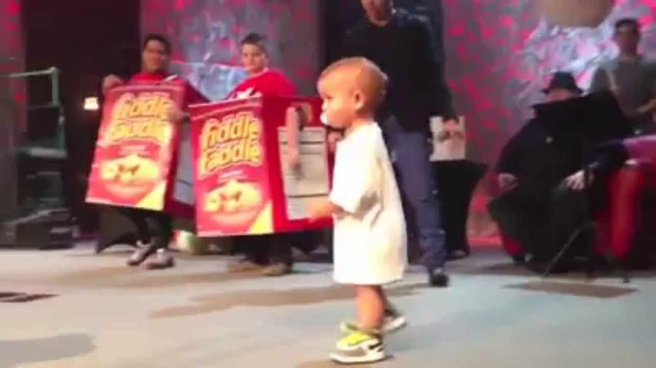 Baby dancing in live show