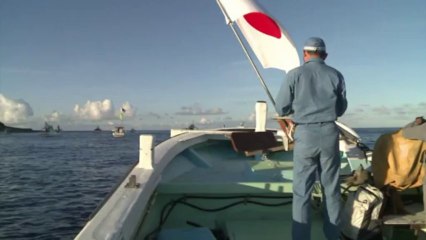 China looks to calm fears over disputed islands