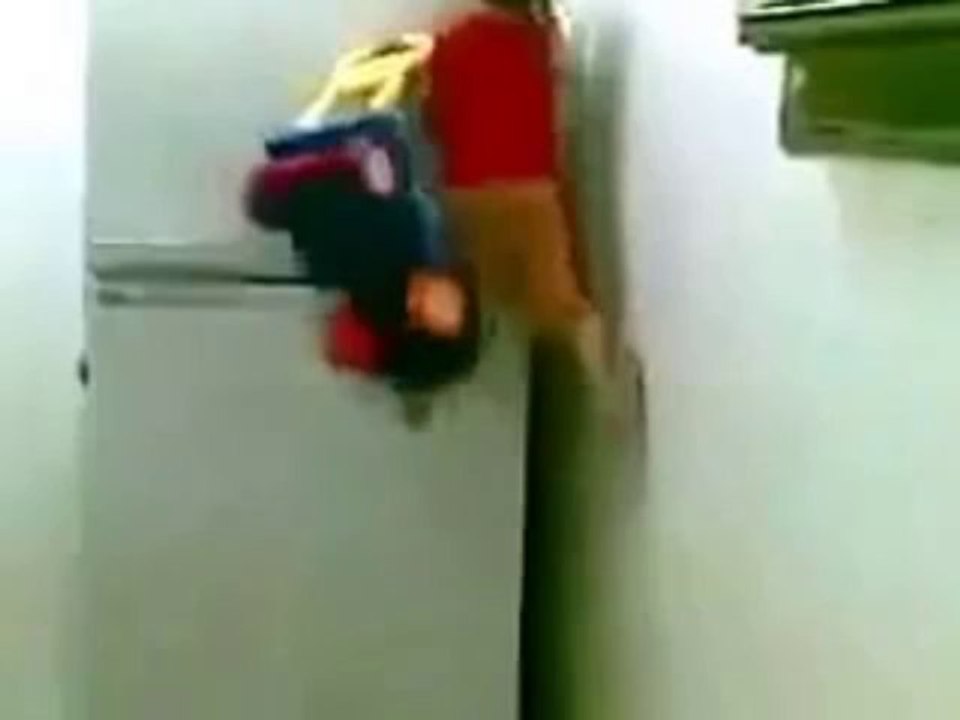 Naughy Kid Climbs the Fridge to Fetch Stuff in...