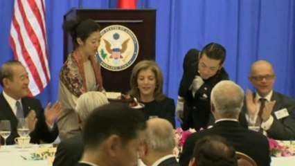 Luncheon guests sing Kennedy Happy Birthday