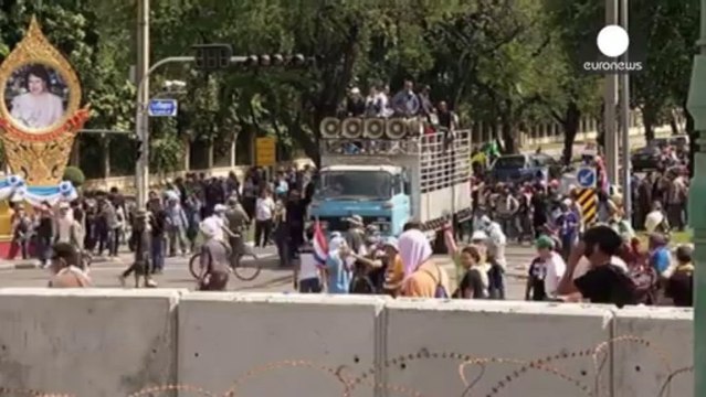 Thailand anti-government protesters seize state TV