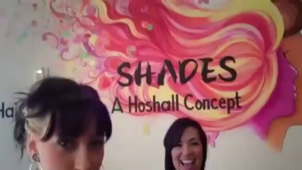 brunette cuts her long hair into a cute bob