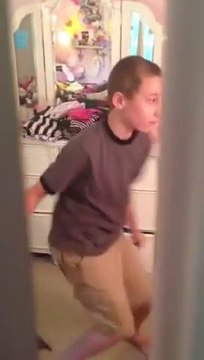 Boy caught by his sister...dancing on Britney Spears music. Shame!